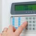 What should you consider before installing a burglar alarm?